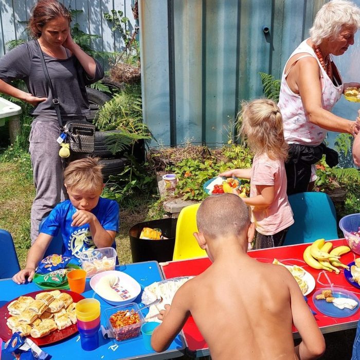 Young people enjoying a fairy garden party at a Traveller site in Cornwall